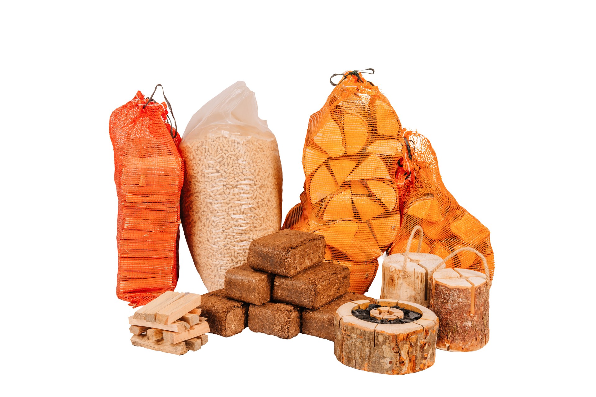Collection of different firewood products including kindling, briquettes, pellets, logs, and Swedish torches, all arranged on a white background.
